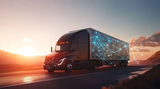 A futuristic truck fitted with advanced digital network technology driving into the sunset