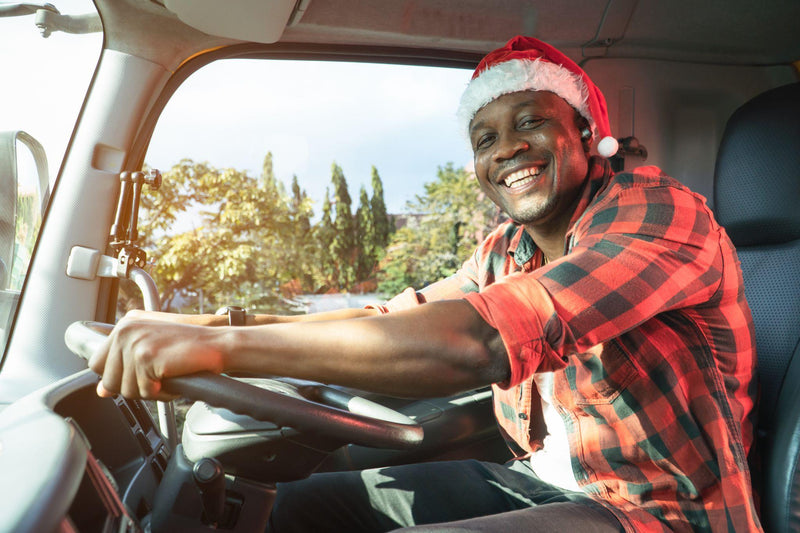 Happy confidence young man truck driver in business long transport.