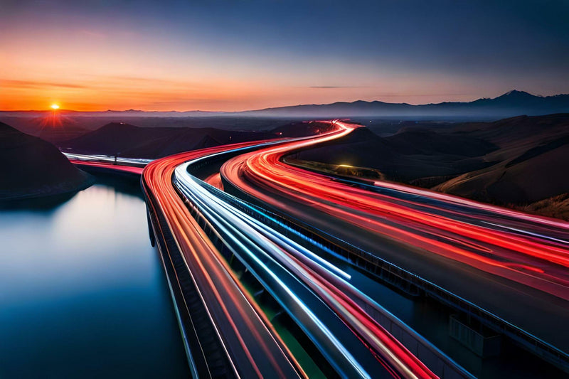 Night highway with colorful light trails